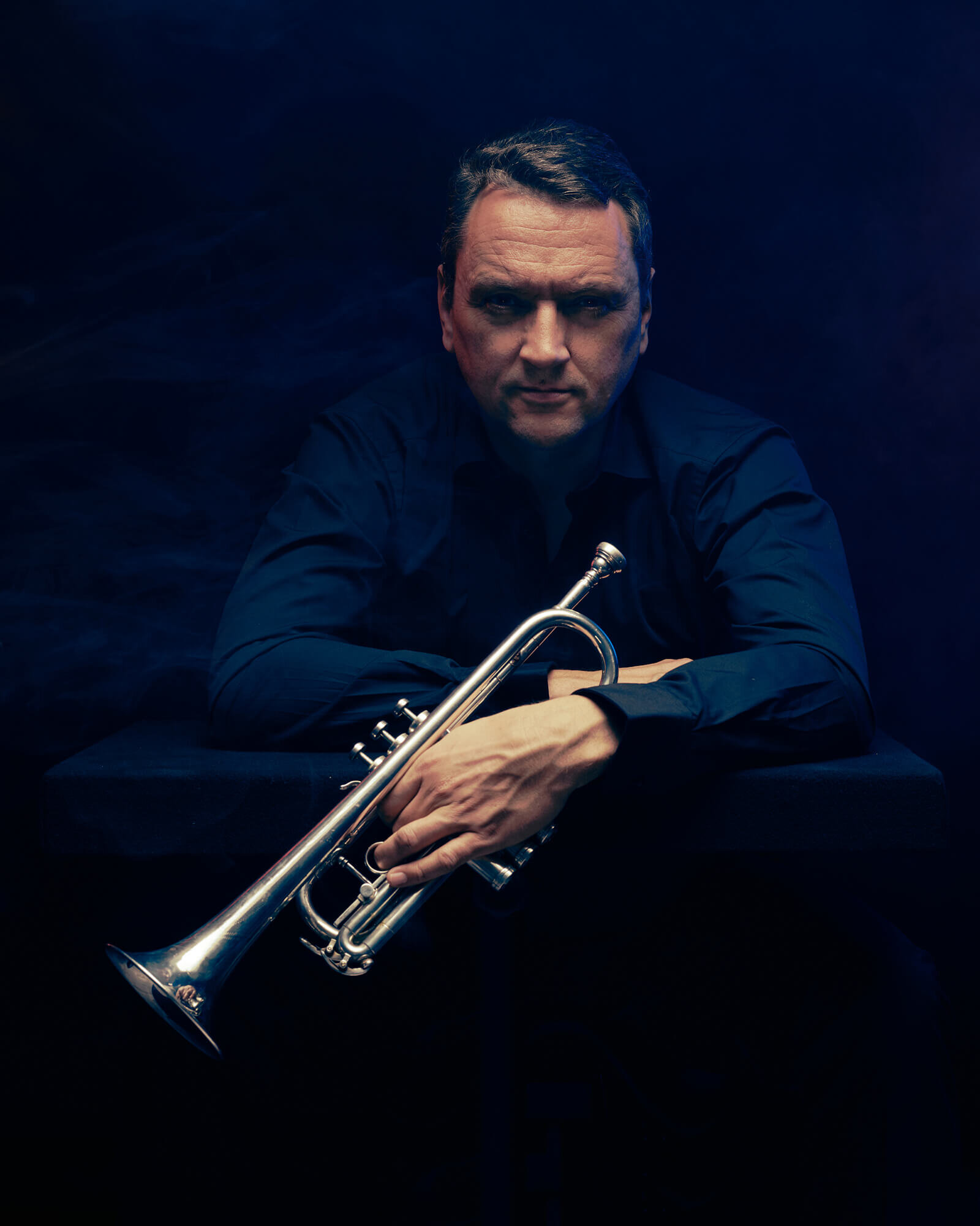 portret-muzikant-trompetist-sfeervol-jazz-personal-branding-man.jpg