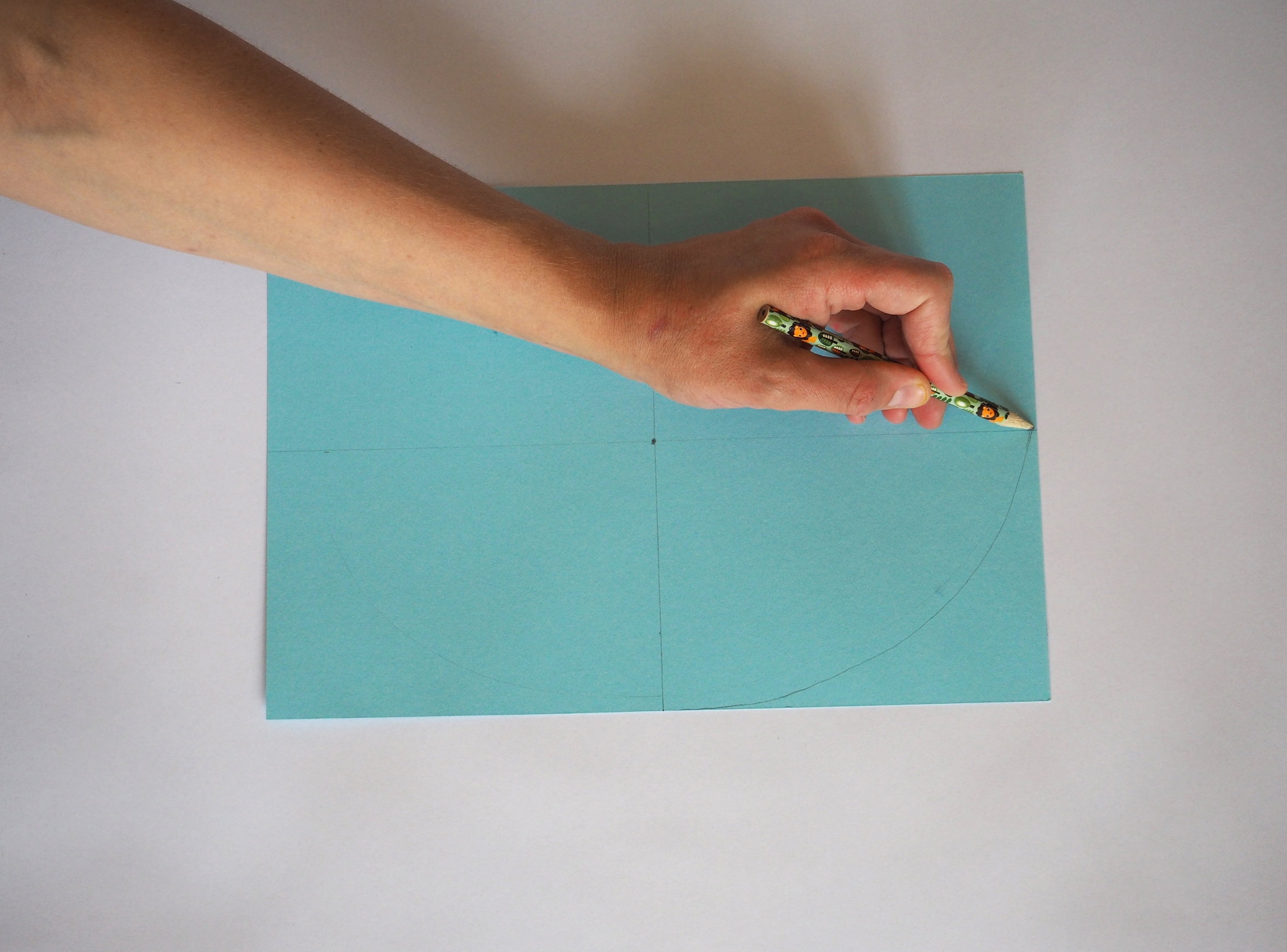  Now draw an oval shape, joining up the four quarters.  