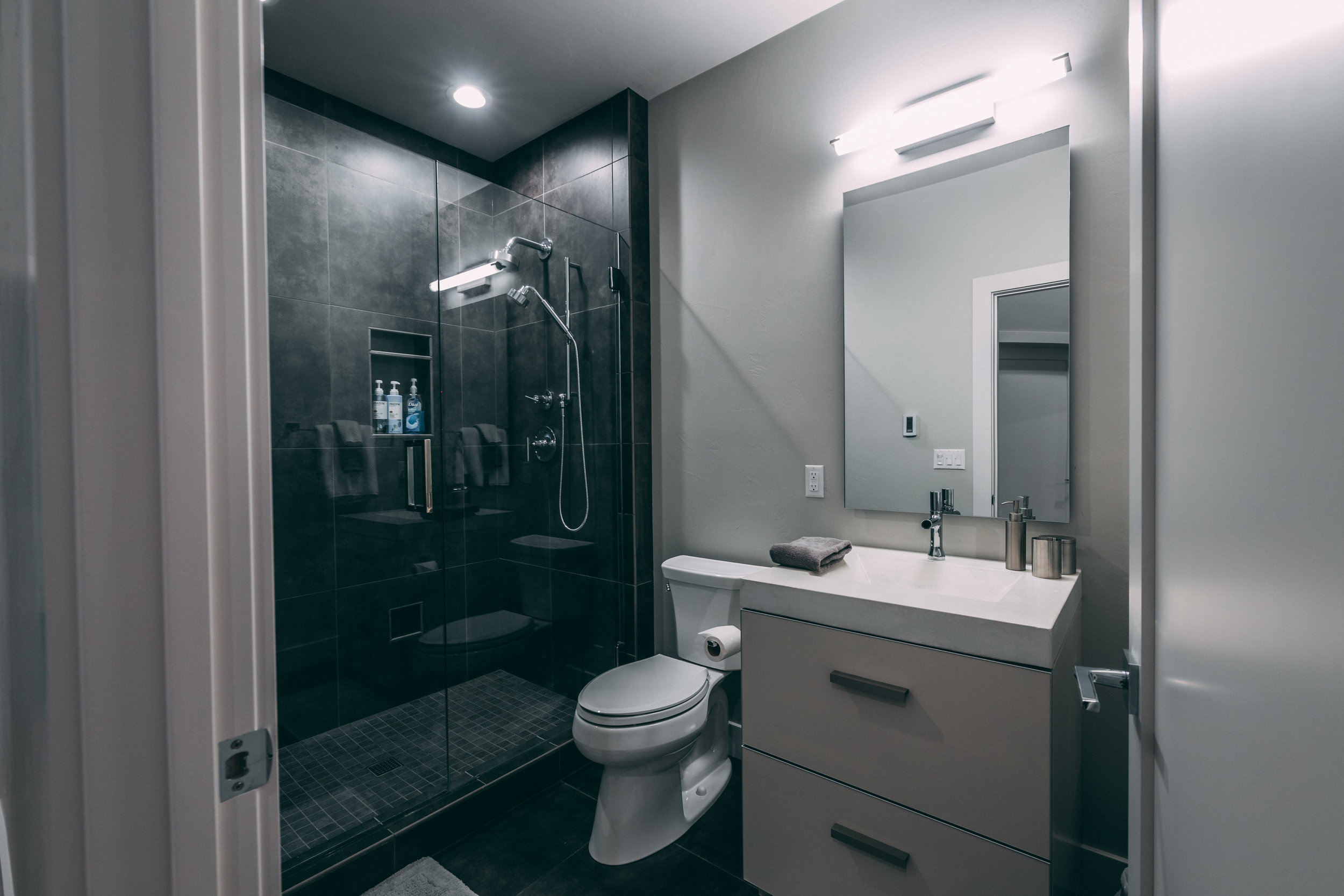 Monte Carlo's guest bathroom is created around KOHLER's simplistic and strong faucets and quality.