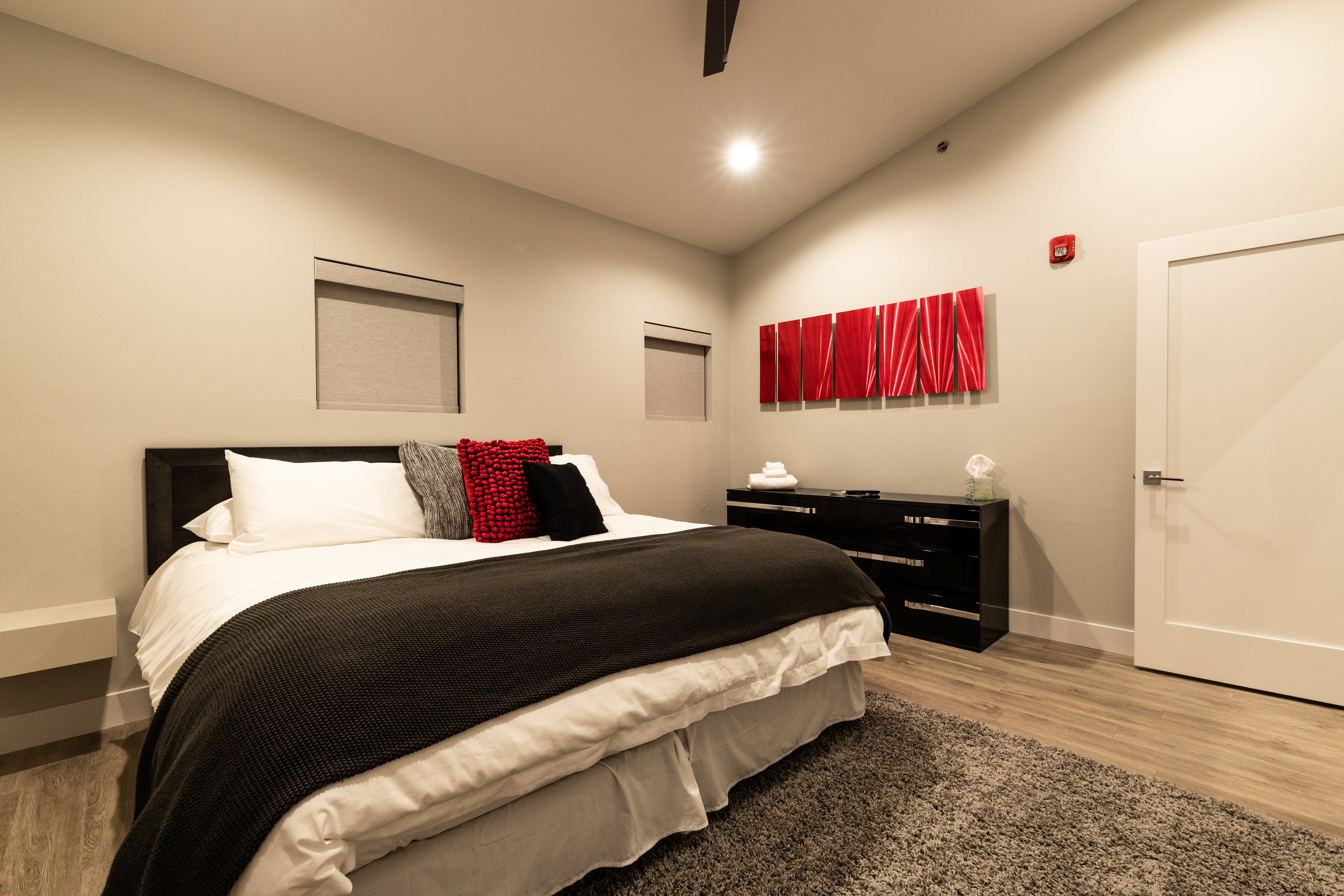 Monte Carlo's guest bedroom in radiant red is just the space your guests want.