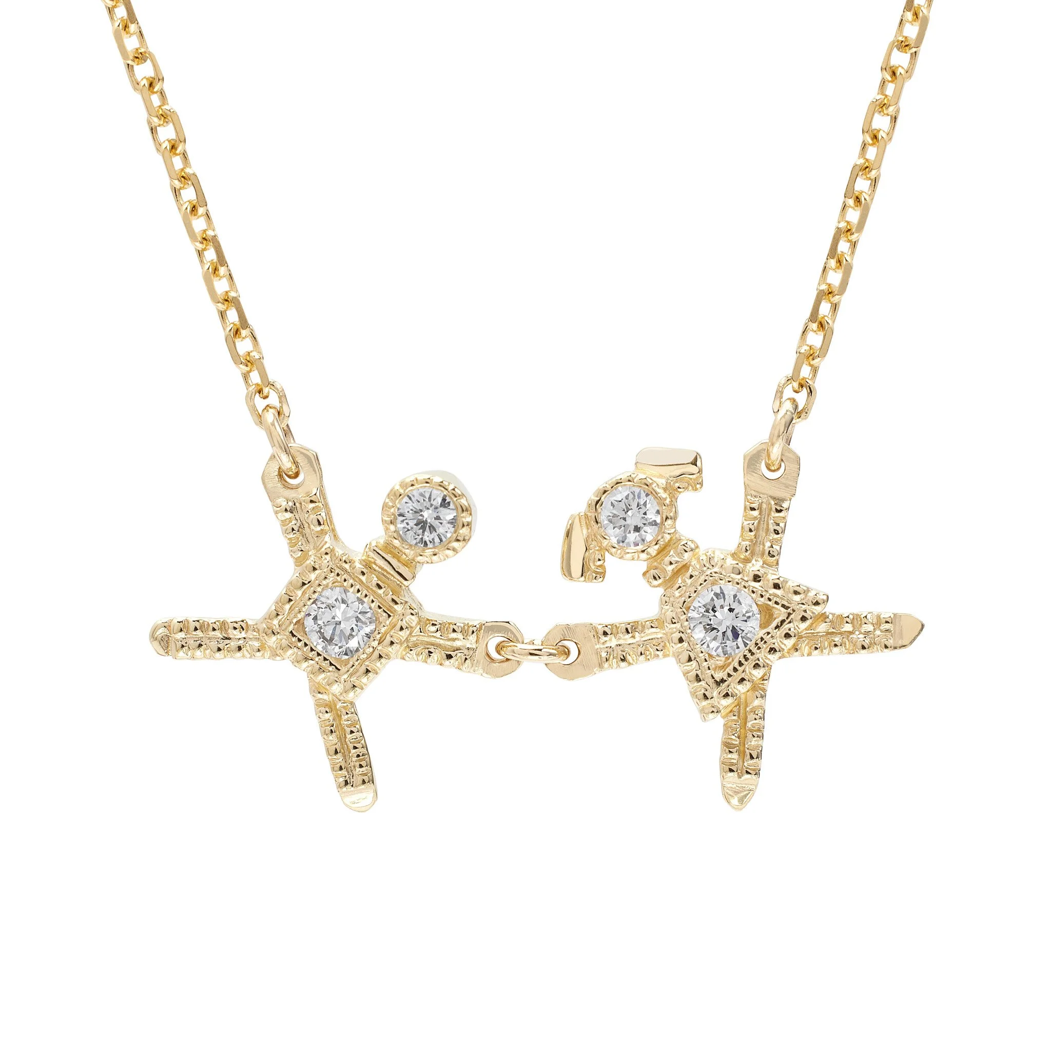 Gold necklace with two star-shaped pendants adorned with clear gemstones.