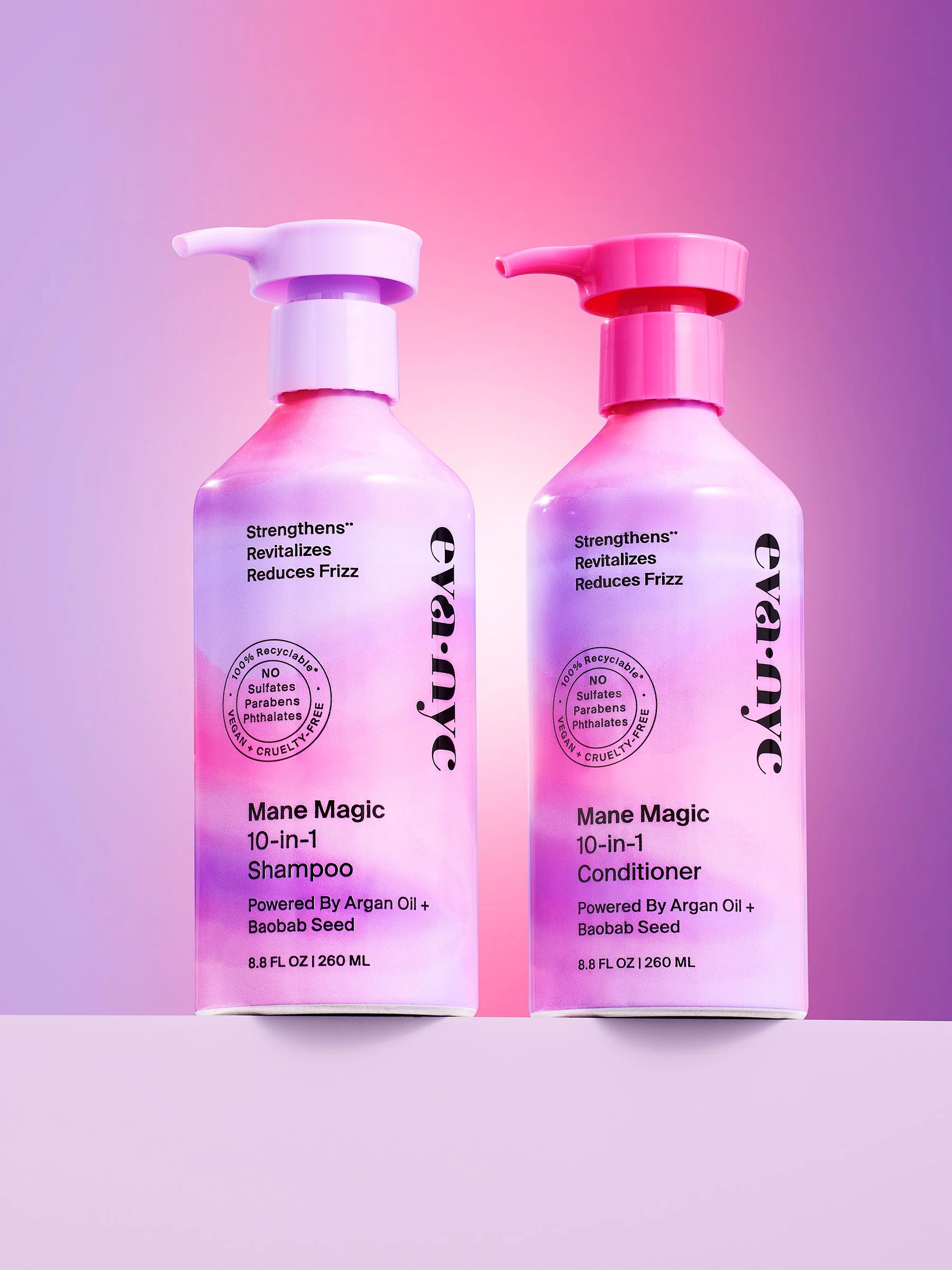 Pink bottles of Mane Magic 10-in-1 shampoo and conditioner with pumps, set against a pink and purple gradient background.