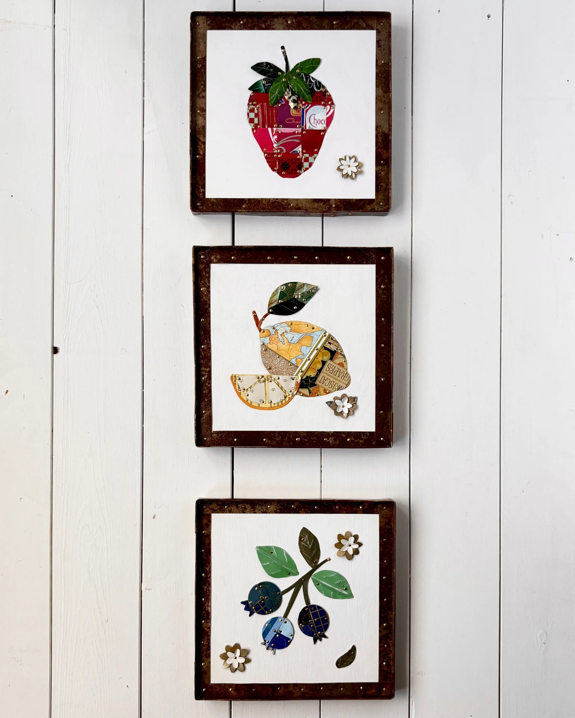 Handmade blueberry tin wall art shown with strawberry and lemon fruit collage collection (Copy)