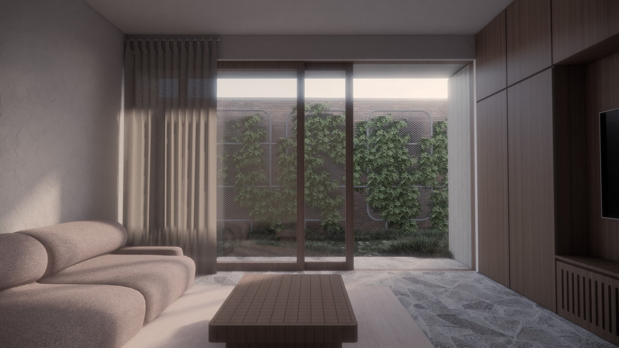 Modern living room with beige sofa, sliding glass door, curtains, wooden wall paneling, stone floor, and a view of a garden with trees outside.