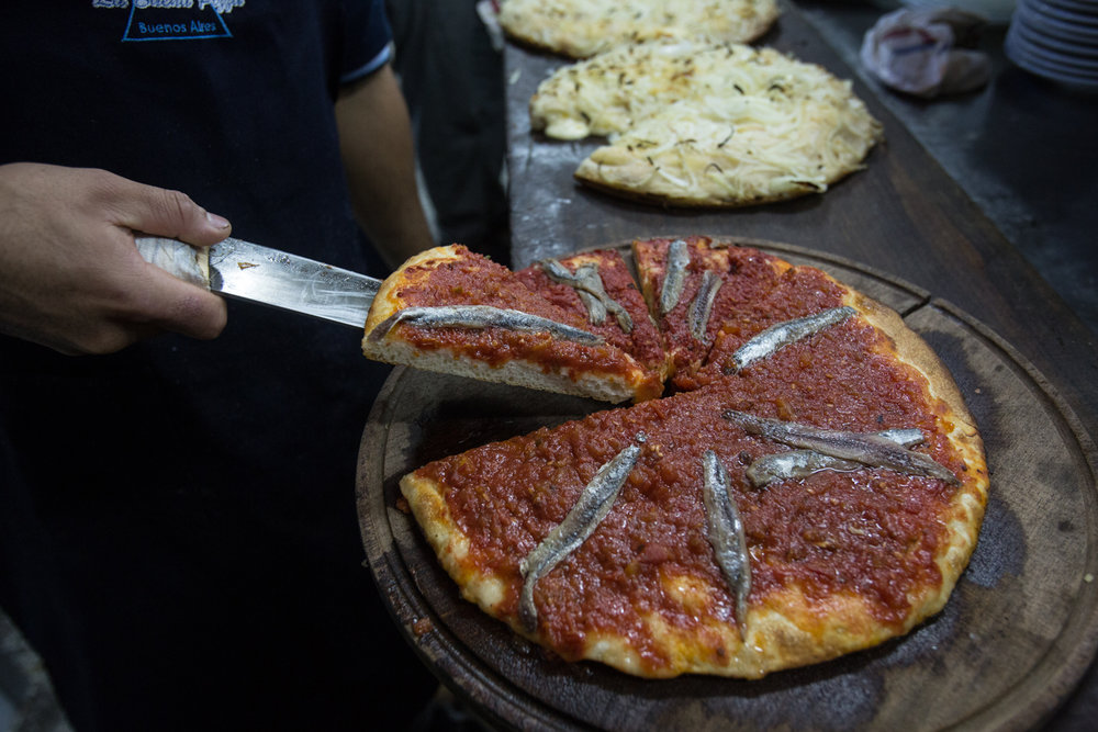  Excellent anchovy pizza. 