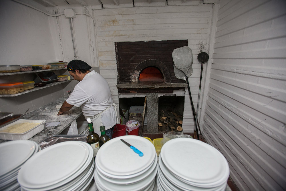 SLIDESHOW: Making pizza at Gypsy.