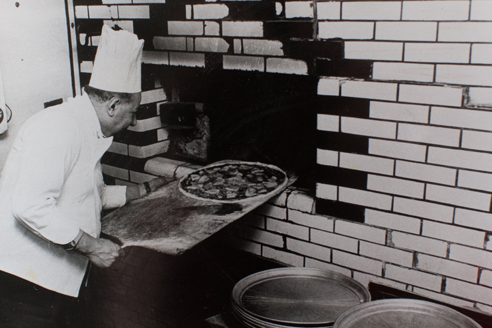  Gennaro Lombardi at the original Lombardi's coal-burning oven, c. 1956 (Photo courtesy Gerry Lombardi) 