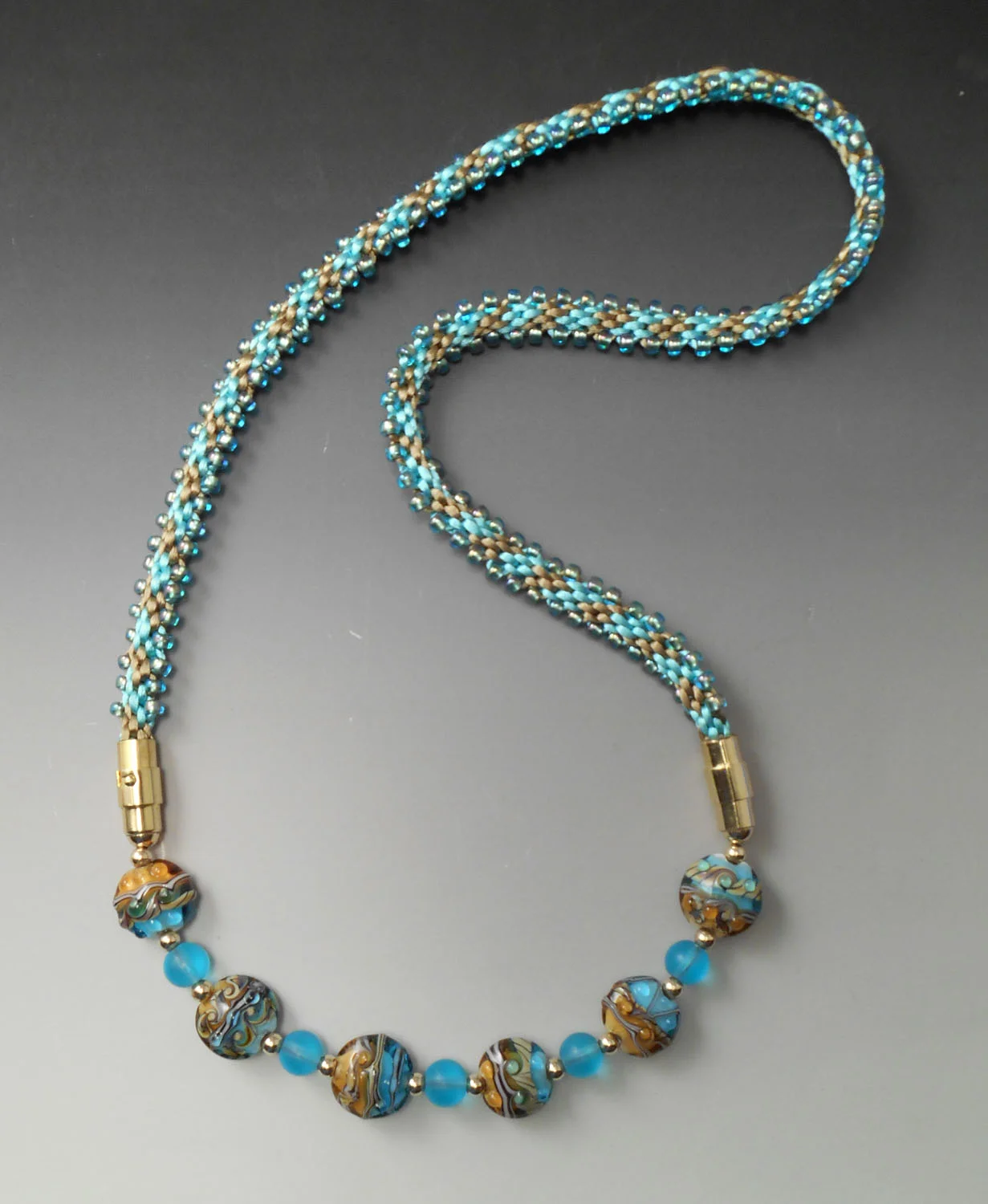 Kumihimo Braid with Dichroic Glass Beads.jpg