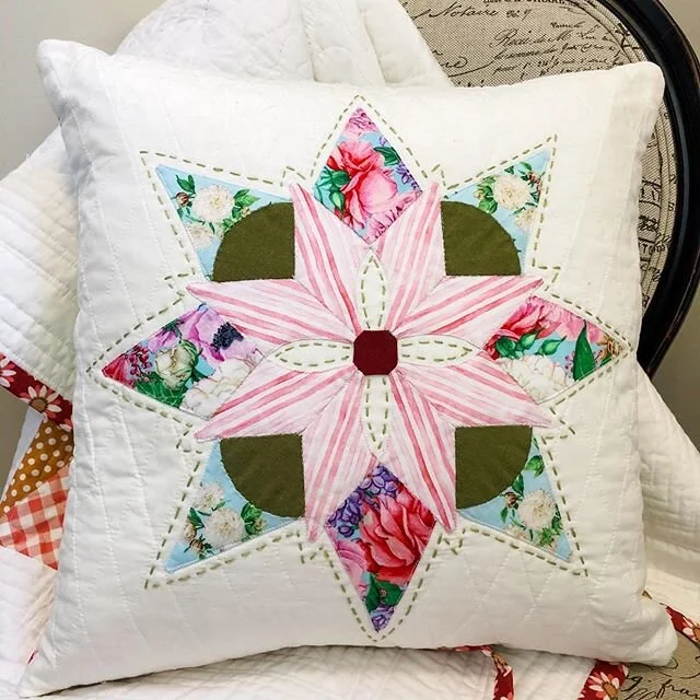 This pillow started as a plan to make a Christmas table topper with 4 Brimfield Blooming Stars from @brimfieldawakening made with Love Letters fabric by @shannonsstudio.  After a busy fall it started a new season as a WIP.  I was so happy when I had