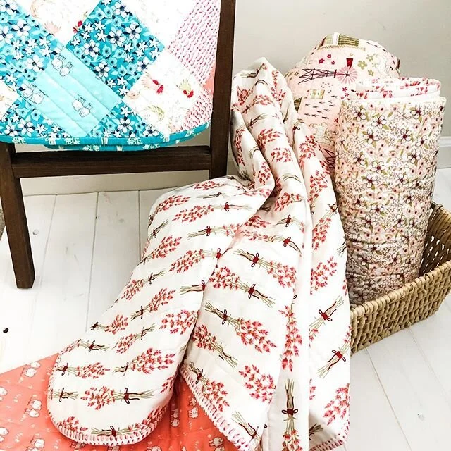 How many baby quilts is too many? π. There’s the special quilt made by Grandma, but when you think of all of the things, the floor quilt, the mini van quilt, the little one that fits in the diaper bag...., and we haven’t even started wit