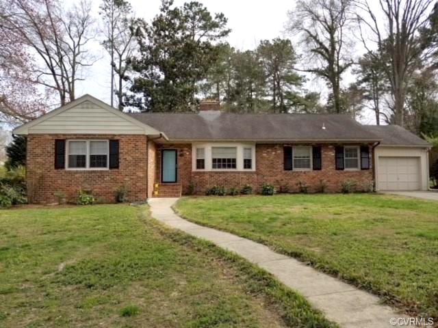 Updated brick rancher with attached 1 car garage located on a spacious corner lot. Rear fenced yard with concrete patio. Master bedroom with walk-in closet and master bath with new floor. Two additional bedrooms and updated hall full bath. Family room has new carpet, new paint and gas log fireplace. Large update kitchen with eat-in area, island, gas cooking and stainless steel appliances. Utility room has new washer and dryer. Formal DR off kitchen. Large living room flooded with natural light through large bay window and a fireplace. All appliances, W & D convey. Property hooked up to City Gas.