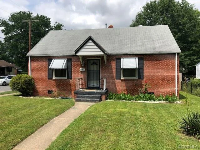 This beautiful brick cape style four bedroom home is being offered at an incredible price. Situated on a HUGE corner lot that is fenced in fully and has a 6 foot privacy fence in the rear. On the first floor there is a large living room, dining room, TWO bedrooms and one full bath along with a nice sized galley kitchen. Upstairs there is one bedroom and a loft area that could be used as a forth bedroom both with newer carpet and paint. In the back yard there is a fully finished man cave or sitting room that offers additional entertaining or storage space. Come take a look and fall in love for yourself.