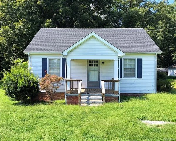 You are going to LOVE this charming craftsman style home sitting on OVER 3 Acres of land in the desirable Midlothian area. The home has a NEW 35 year dimensional roof and newer gutters, Aluminum maintenance free siding and flashing of all trim as well as two detached sheds/garages. Offering three bedrooms this home is situated well off of the road and has been well maintained. Most of the acreage is cleared yard space with a wooded portion in the rear. There are many opportunities with the large lot, possible to subdivide the land, build, or just enjoy the space.