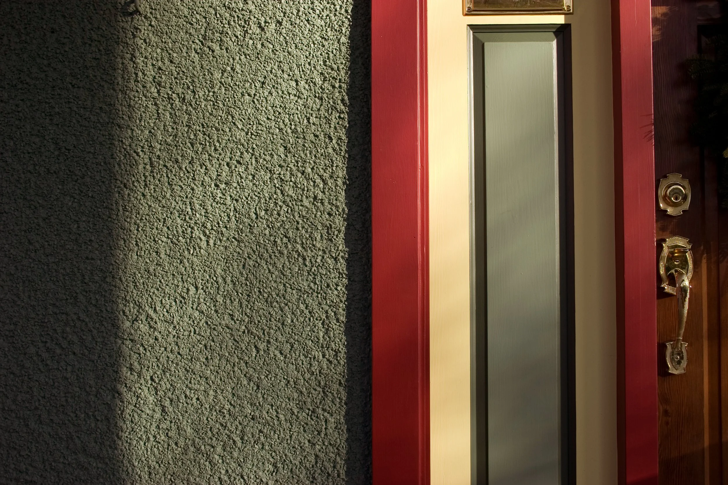 Detail of exterior painting in three colours