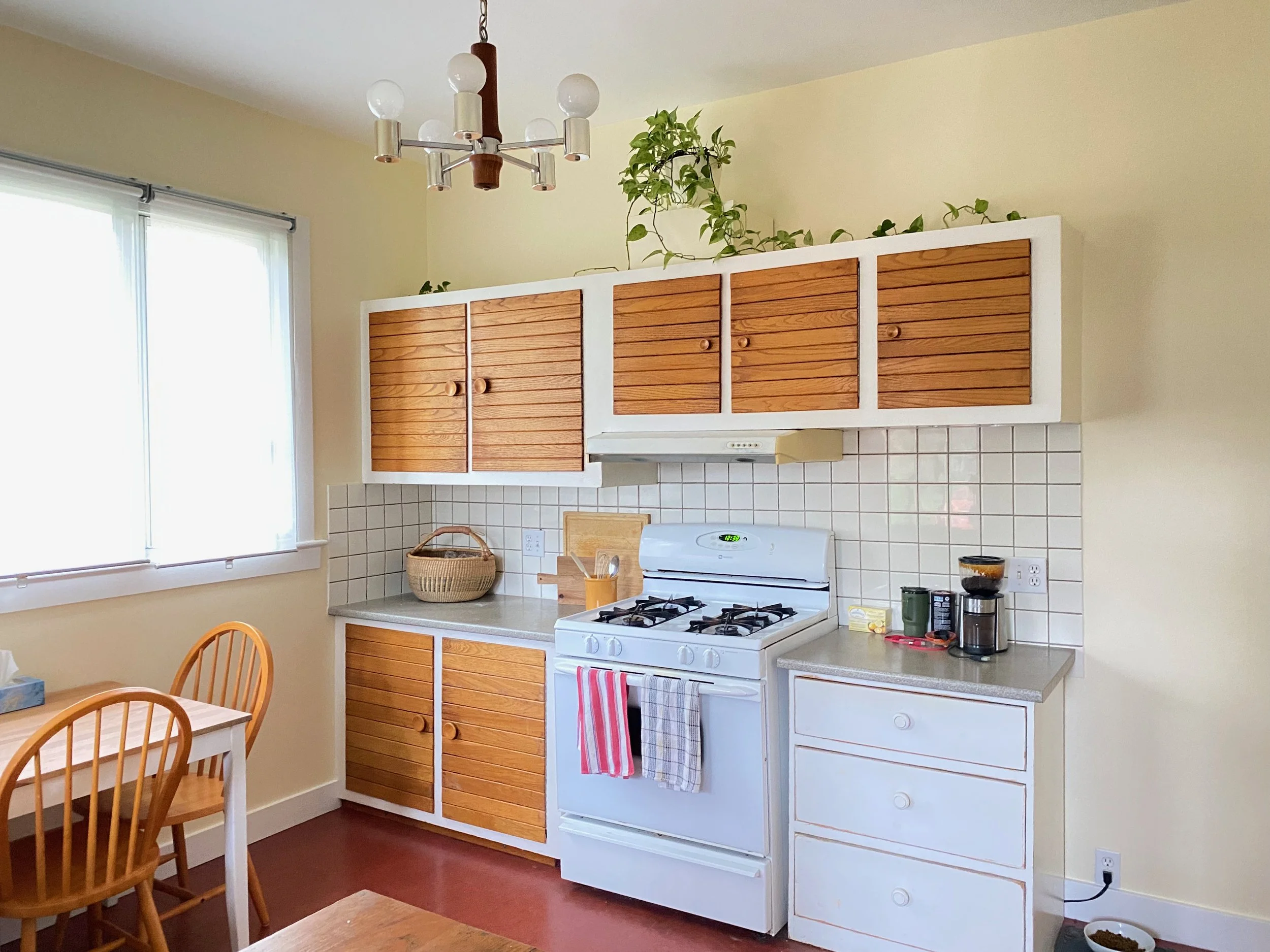 Bright interior kitchen painted in soft yellow