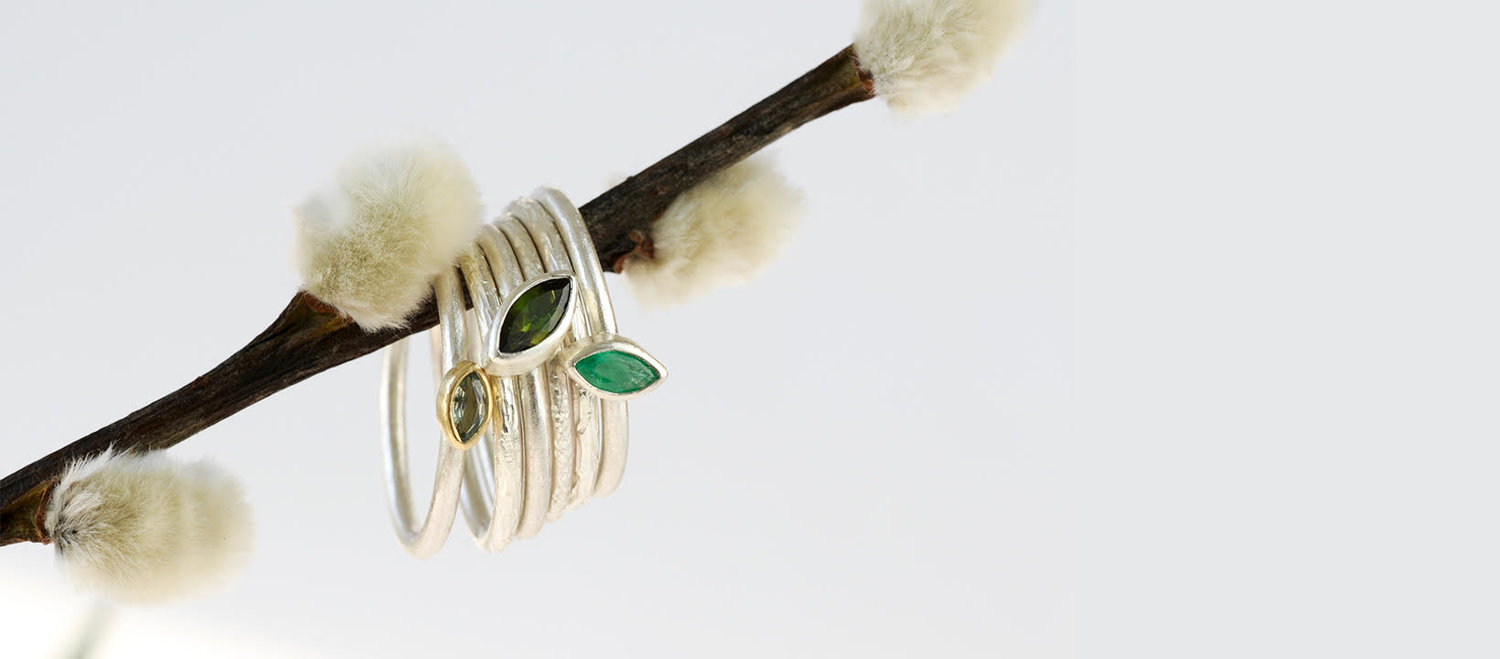 Silver,+gold,+green+sapphire,+green+tourmaline+and+emerald+stacking+rings.jpg