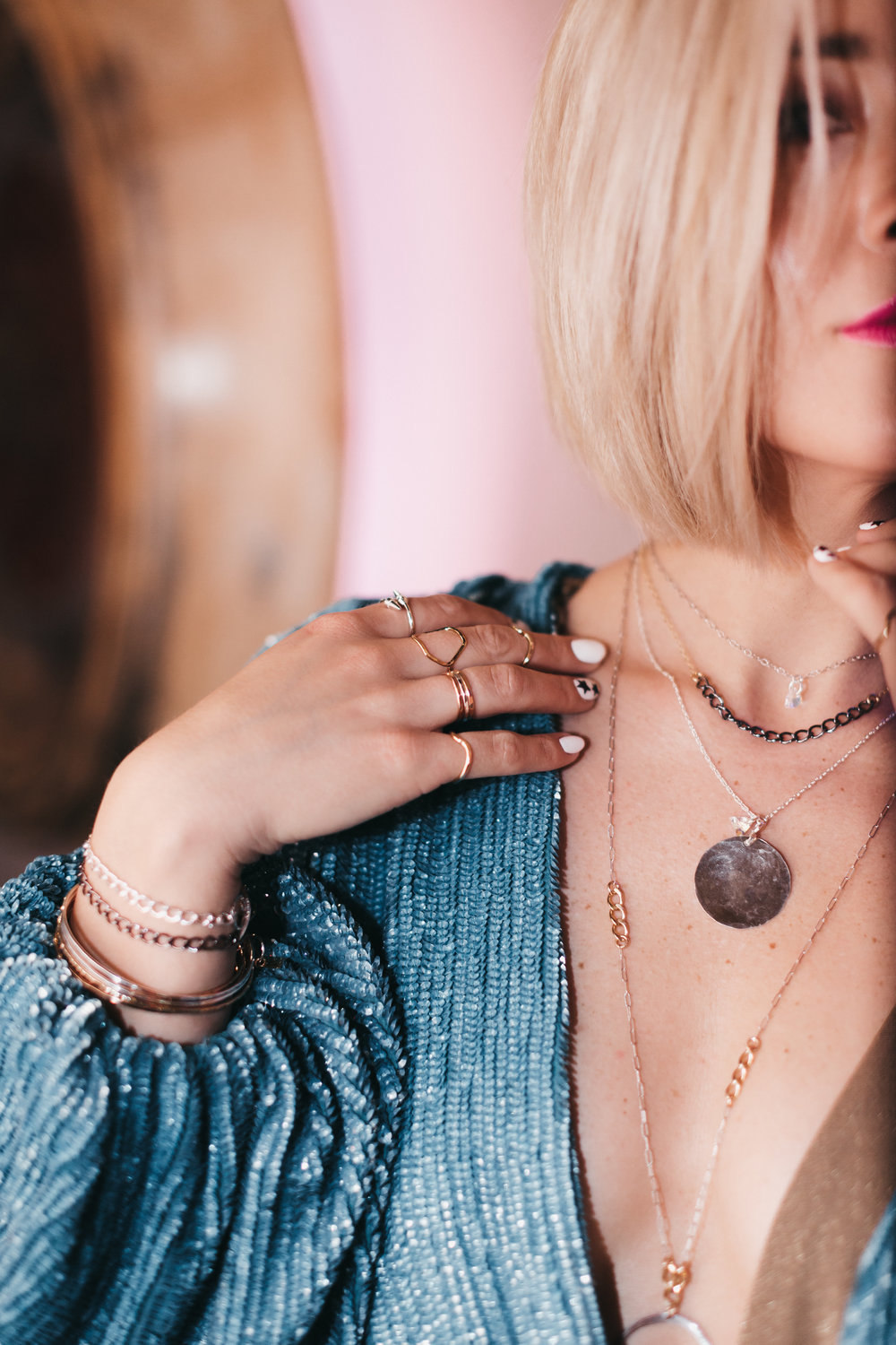 Megan wears the Tiny Dancer,  the Gwen , the Medallion, and  the Stevie . Bracelets:  The Toggle  and the Bangle Bracelets. Rings: Bullet series, Hexagon, Stackable band and the Wave Band.