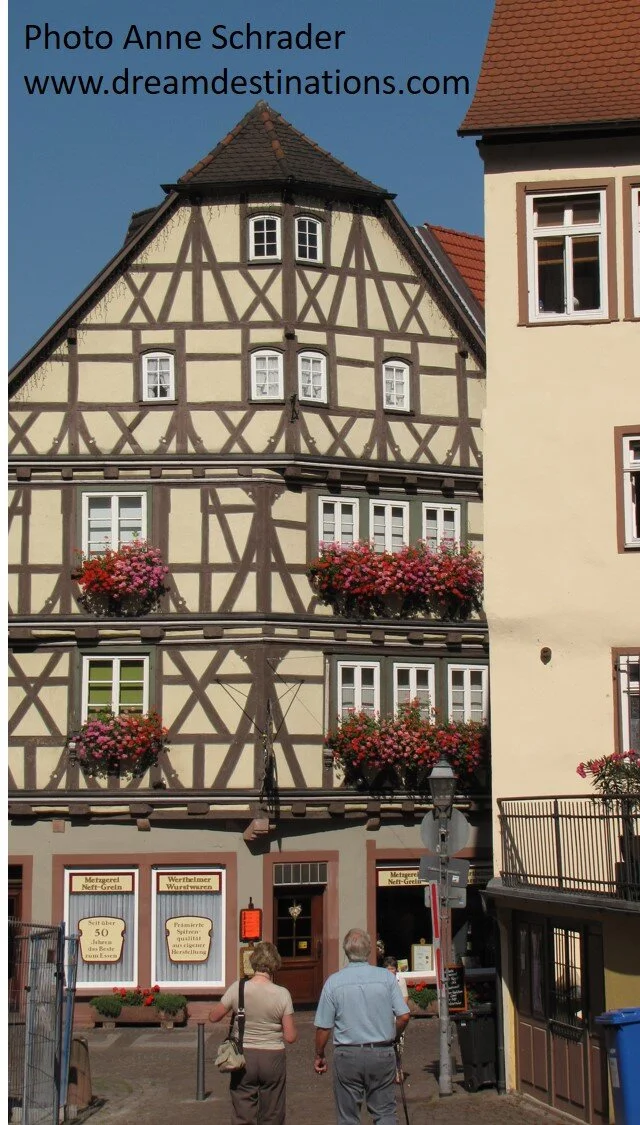 Colorful building in Wertheim with flower boxes.