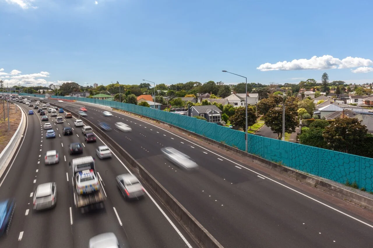 The Ellerslie Noise wall is admired by motorists passing by.