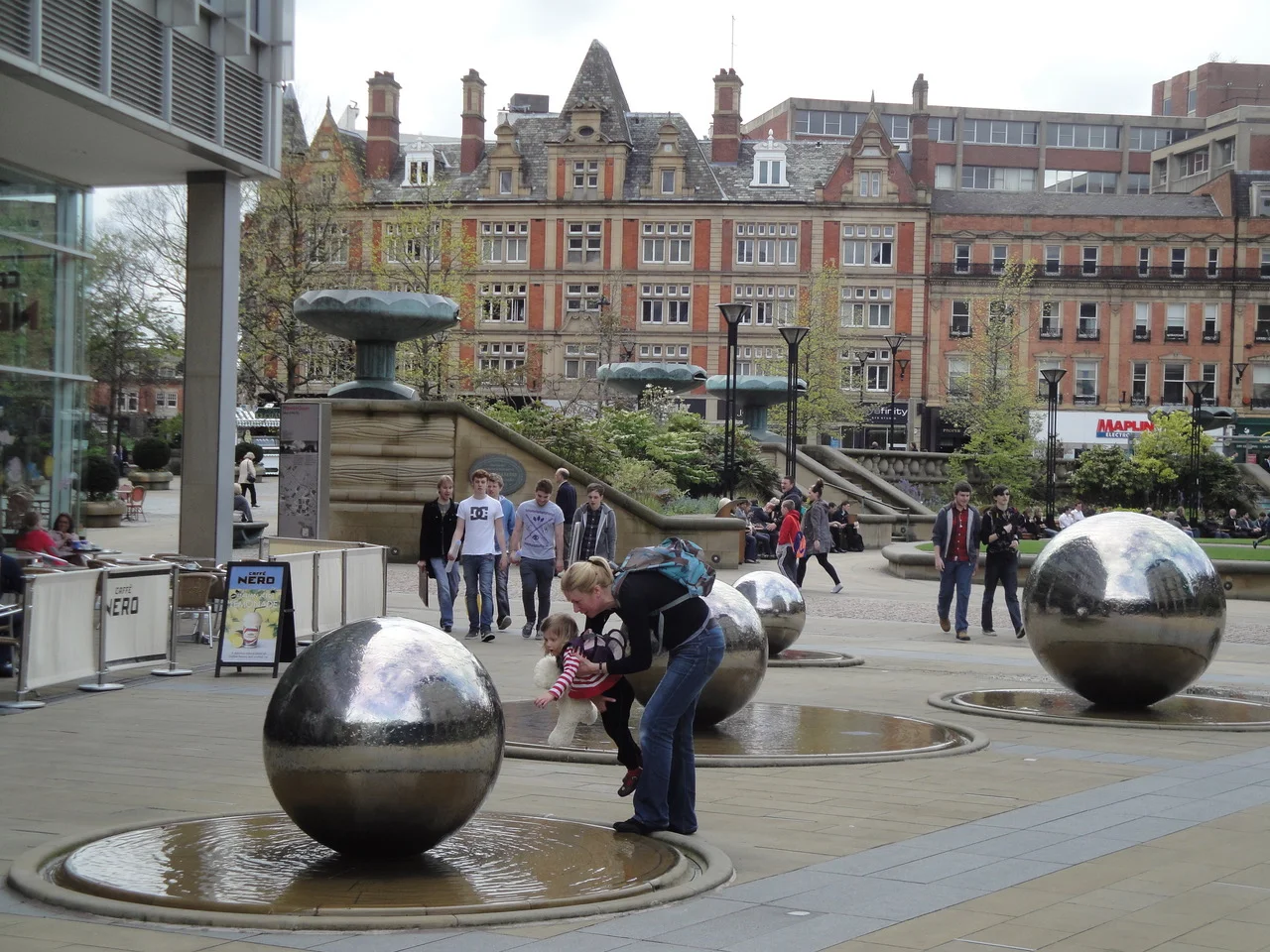 The delight and curiosity of interacting with water in Sheffield, a city with an integrated urban water plan. Photo credit: Jenny Roe. 