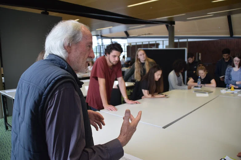 Mike Barthelmeh with students at SOLA.