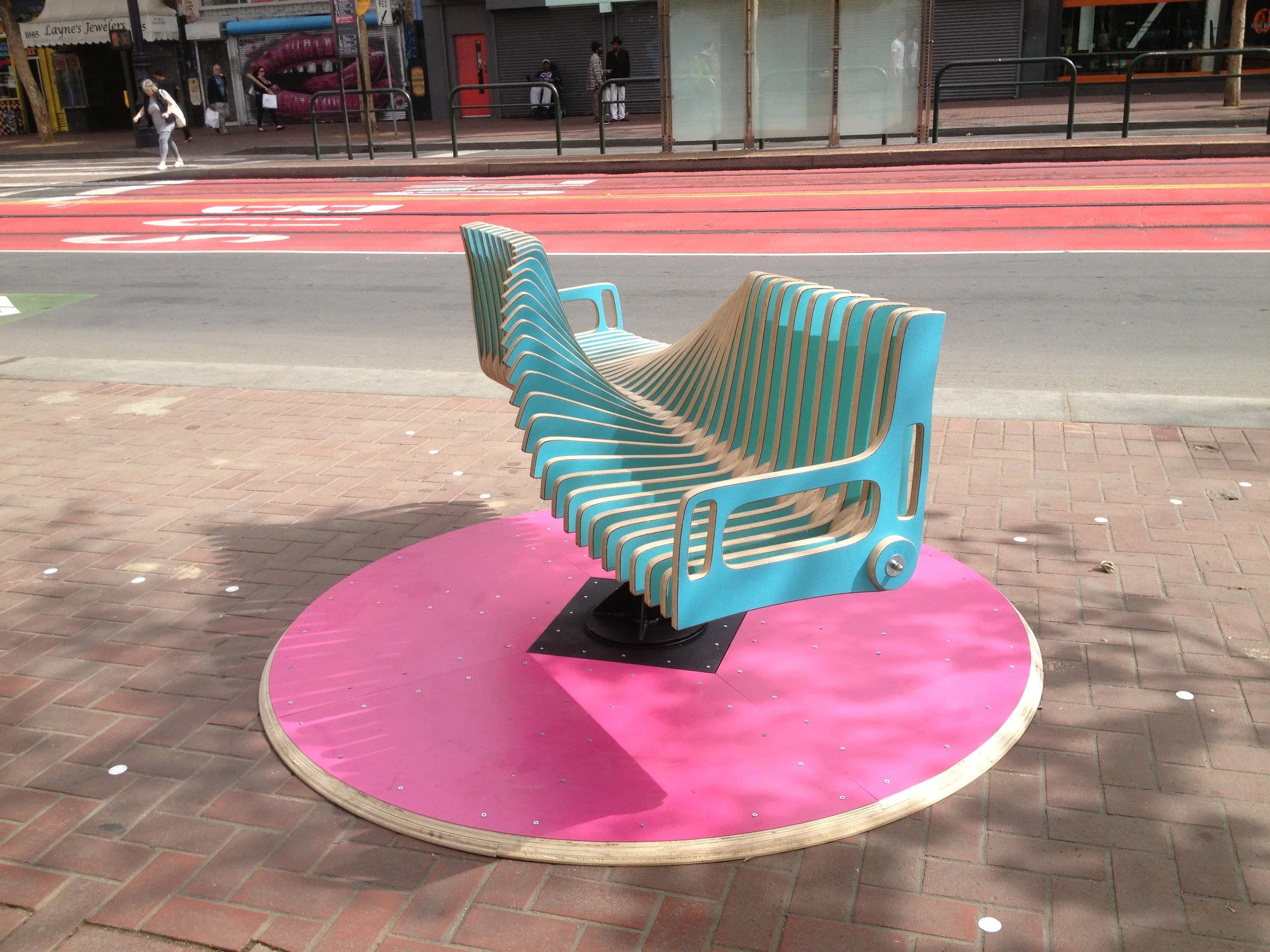 The Bench Go Round playfully re-imagines public seating to create connection between strangers. It's the creation of George Zisiadis and Rachel McConnell in San Francisco. Photo credit - George Zisiadis.