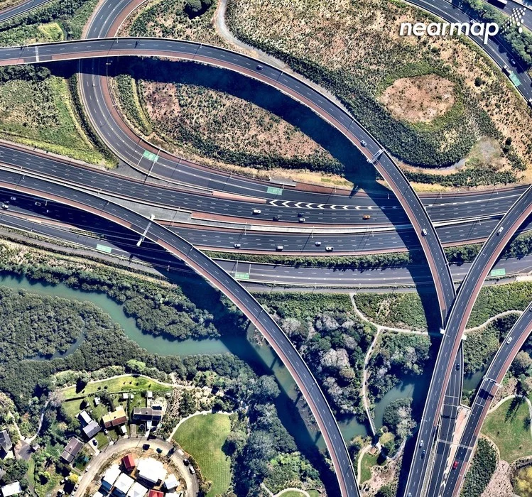 Nearmap offers measurement tools and NZ specific data.