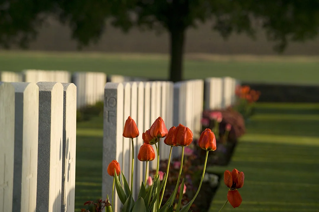 Anzac graves - tending the gardens of our fallen