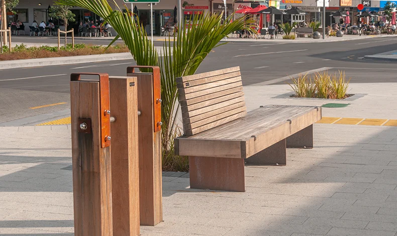 Street furniture uses a palette of Corten steel and Tonka hardwood, both materials used regularly in marine environments.