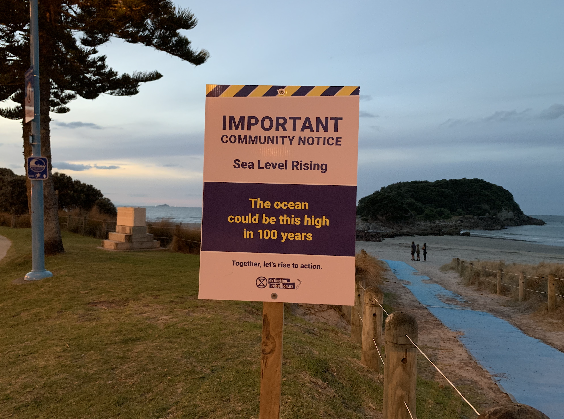 This warning sign sits beside the beach at Mount Maunganui.