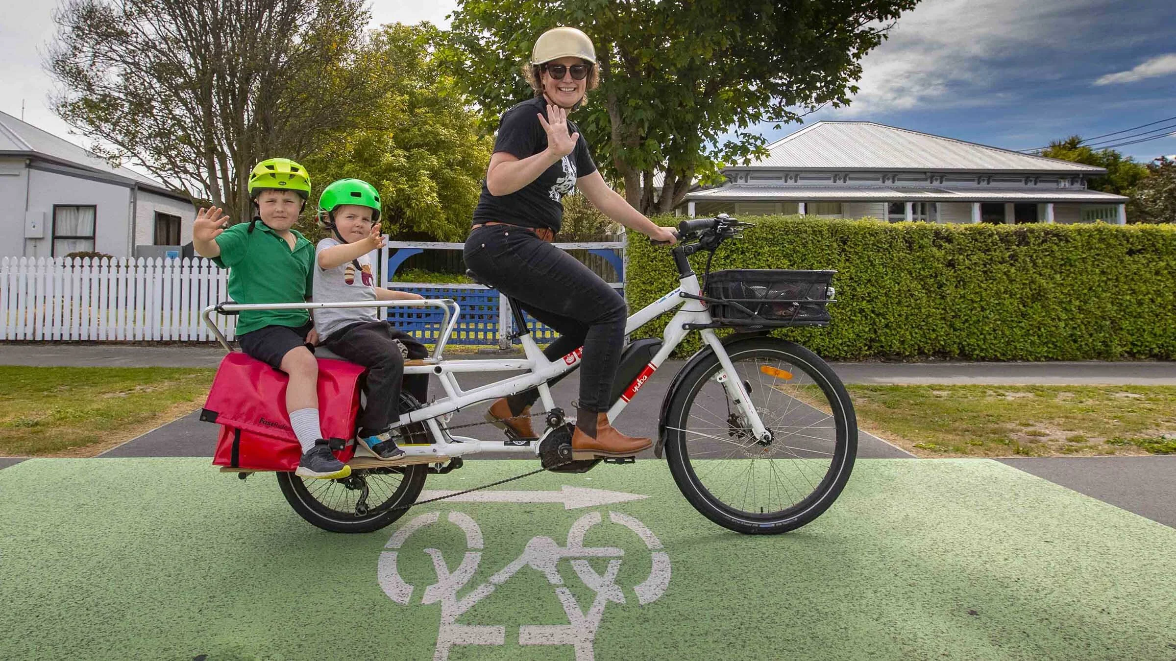 Women cycling with children. Source: Christchurch City Council