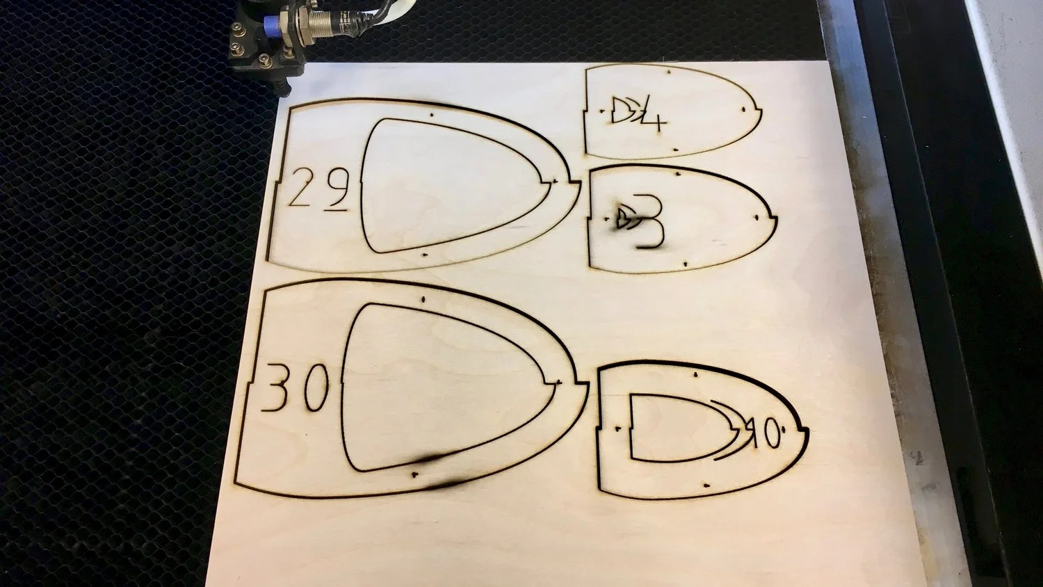 One (out of 8) of the exported Slicer files, cut out of wood.
