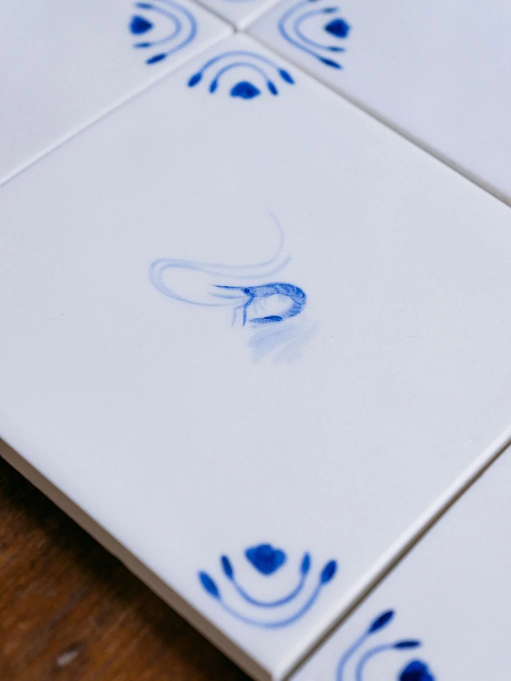 Hand painted Delft style tile carousel 🎠 how cute is that tiny shrimp? There should be a carousel full of tiny shrimps instead of regal horses 🦐 should that be our next project? Tiny shrimps carousel? 💭