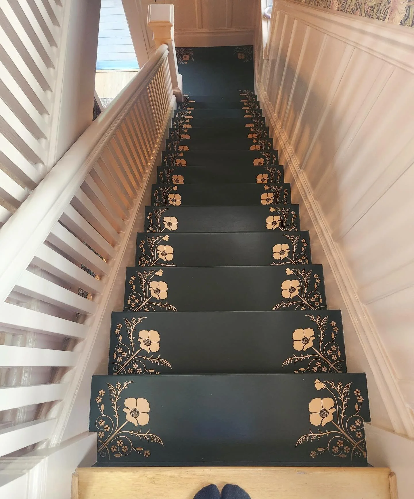 We teased you with the before - now peep the after (+ a zillion process photos) of our recently completed stair stenciling project for @landedinteriors 🤩🤩🤩

We designed the custom poppy motif stencils to perfectly fit the corners of the stair trea