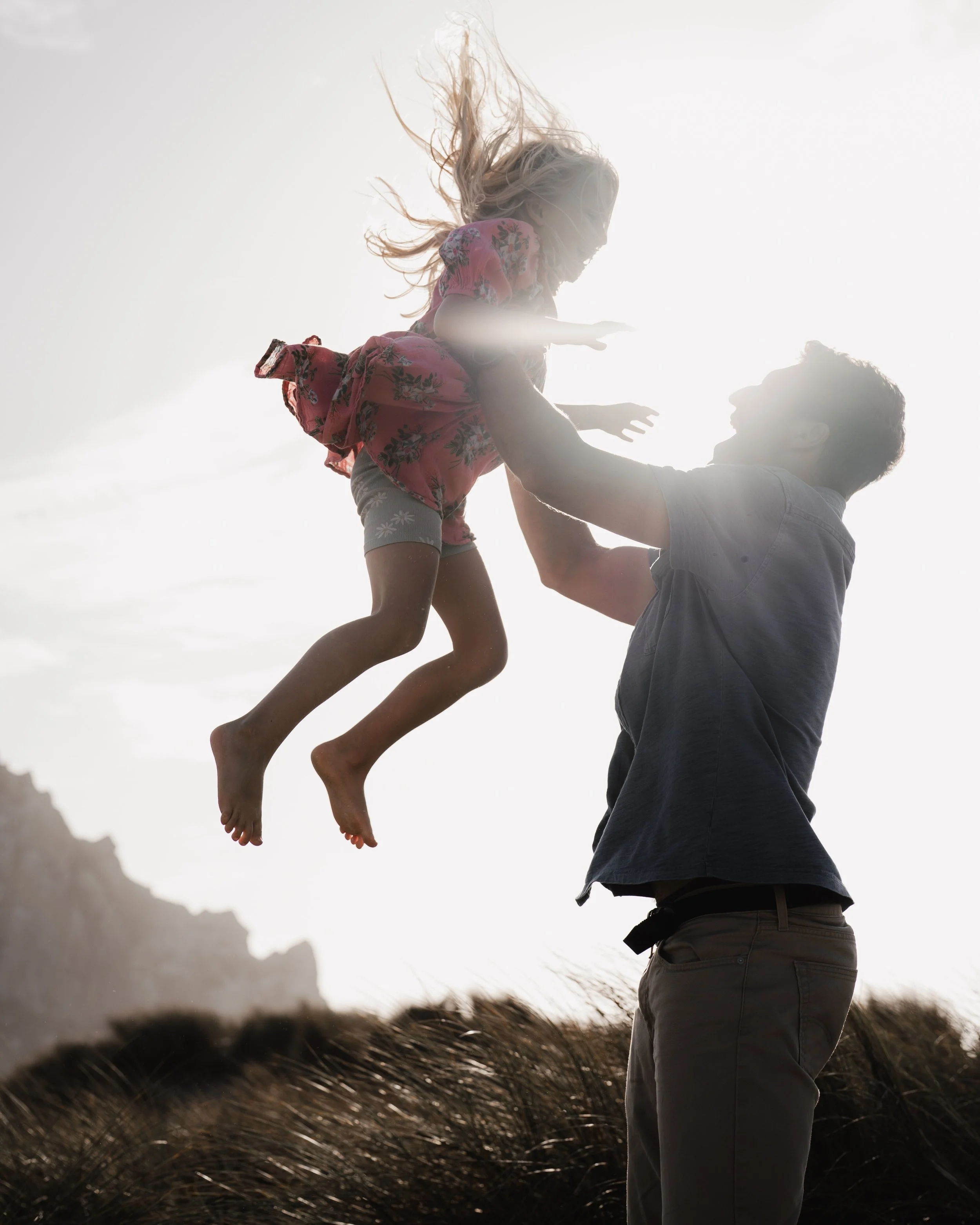I really love capturing families as they would naturally move and play together ... I am not a fan of posing children for 30 minutes or an hour. It never works out. I always get the most genuine photos by asking parents and children to play, dance, a