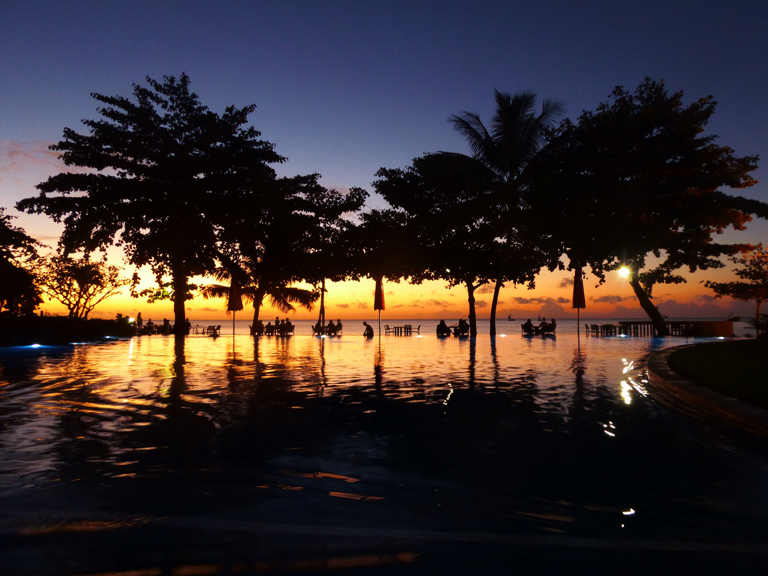 Sunset by the pool in Tahiti