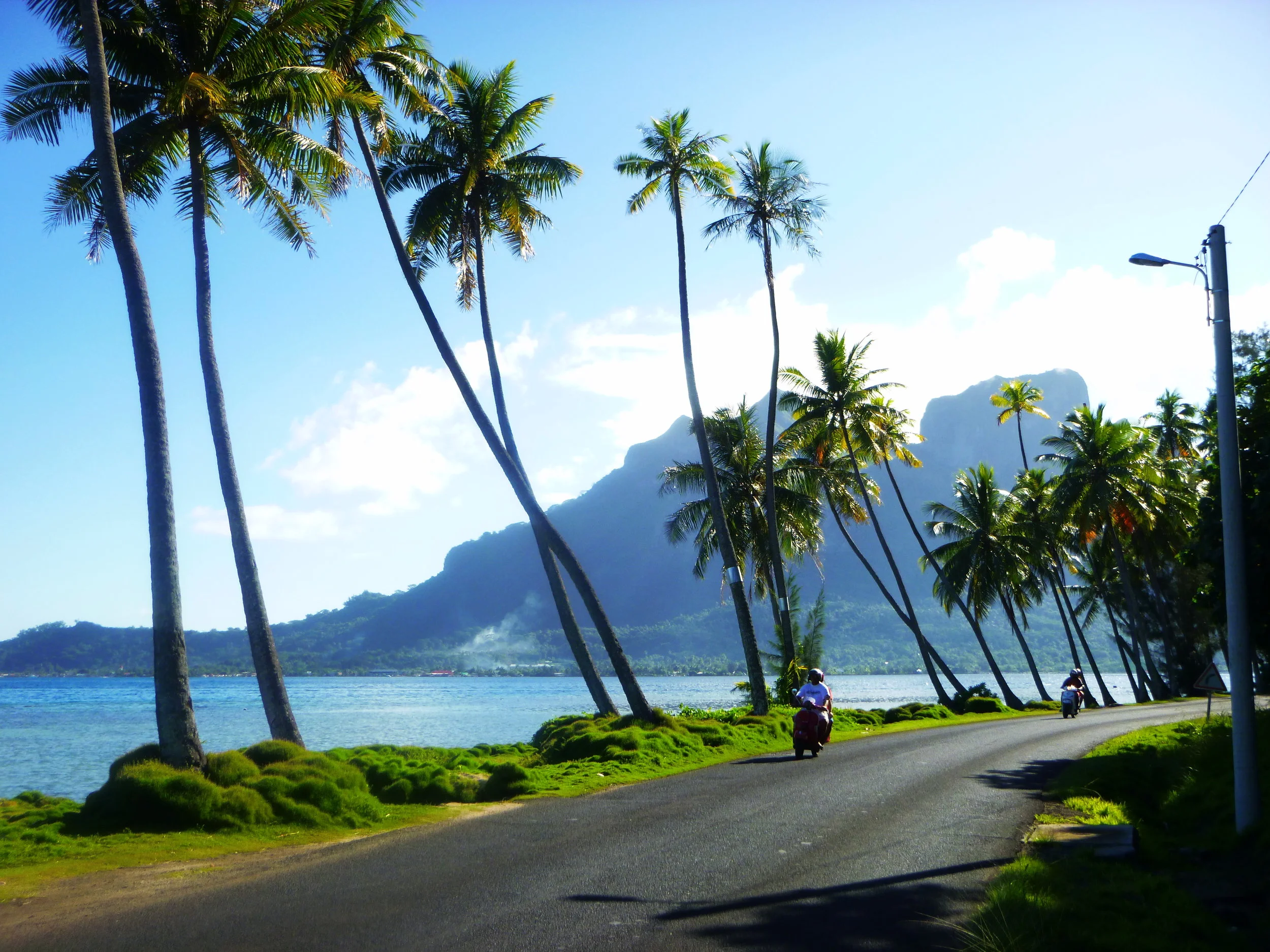 Beautiful vistas and coconut-lined roads make even walking in Bora Bora a pleasure
