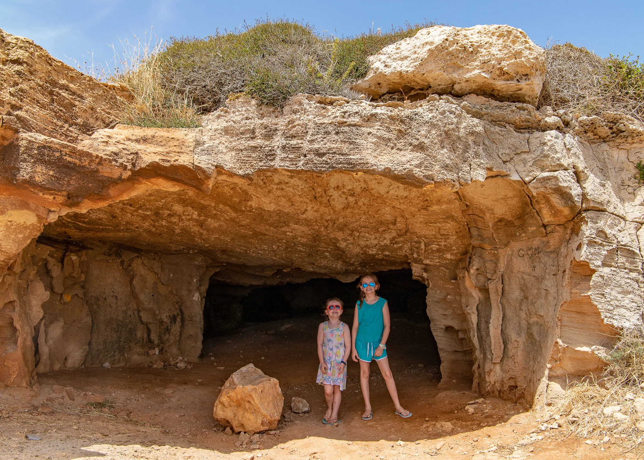 Cyclops fodder with the much worn down rock which Polyphemus rolled to block the entrance to the cave each night