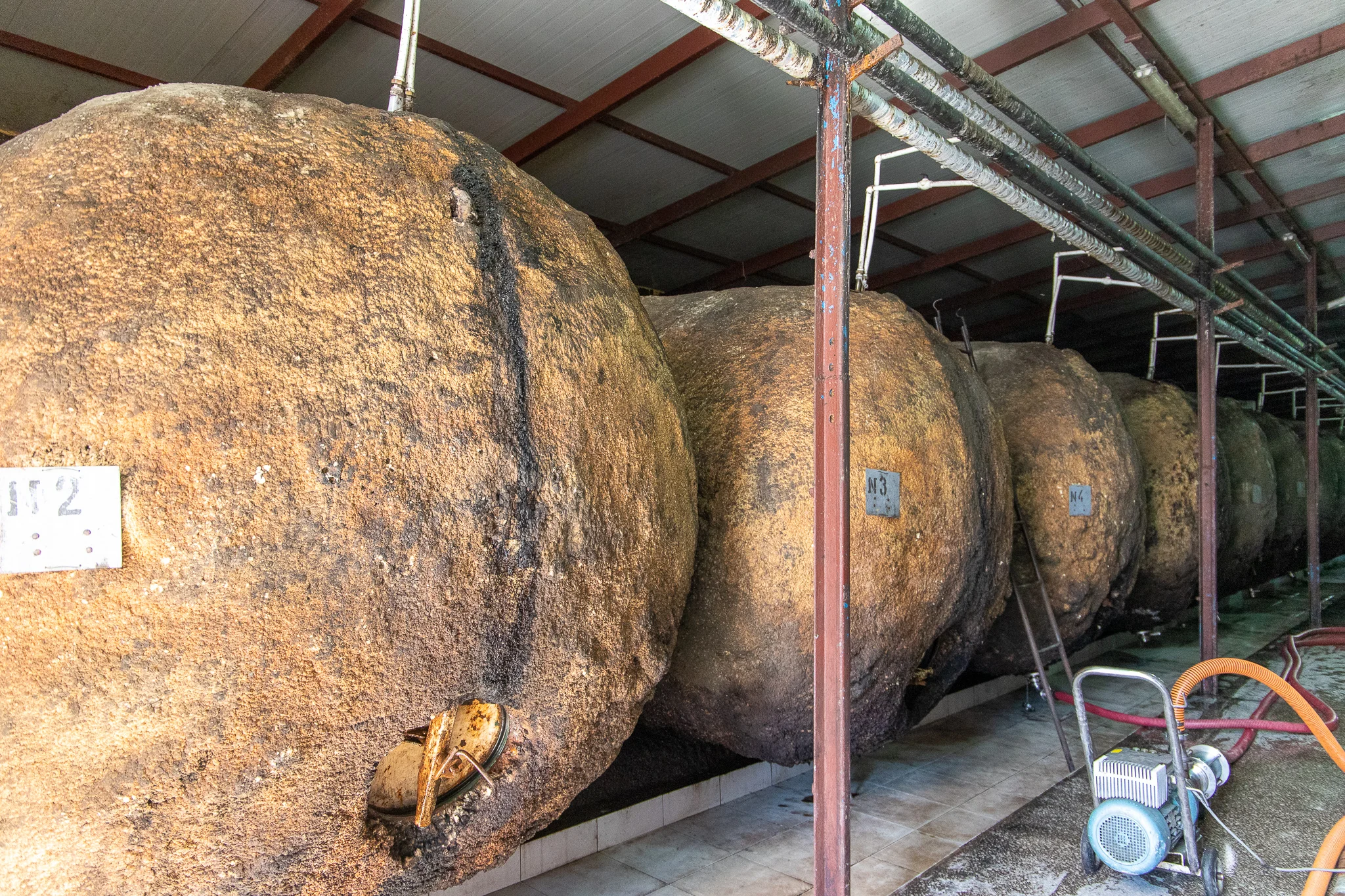 Looking eerily reminiscent of the eggs out of the movie Cocoon, these actual are vats covered in foam to insulate the wine