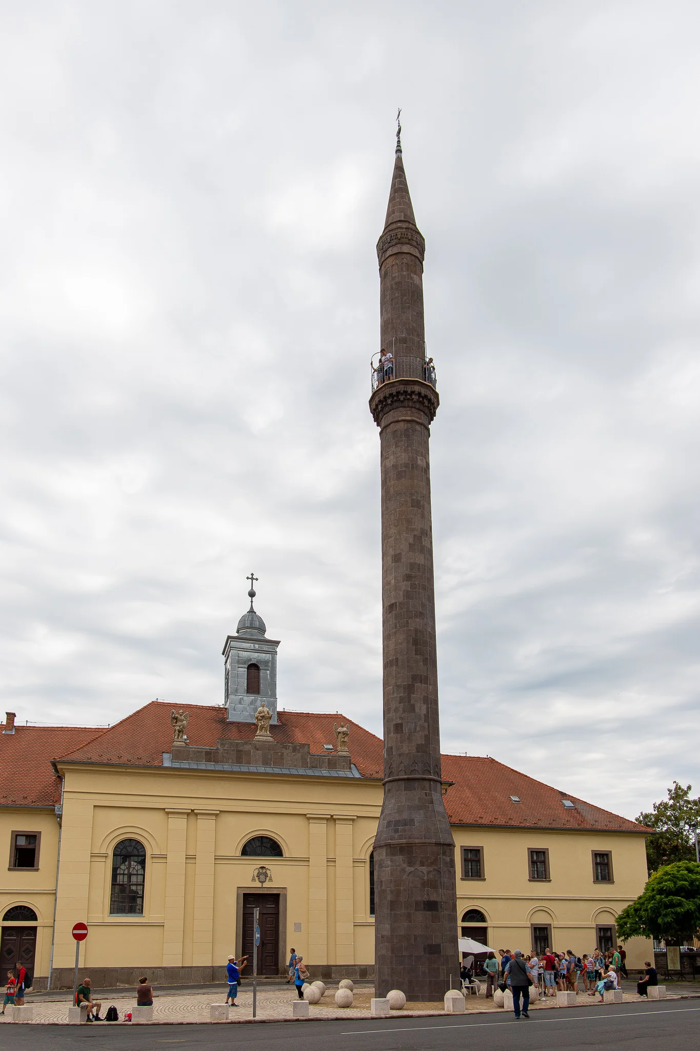 Eger Minaret with tourists on the balcony taking in the views