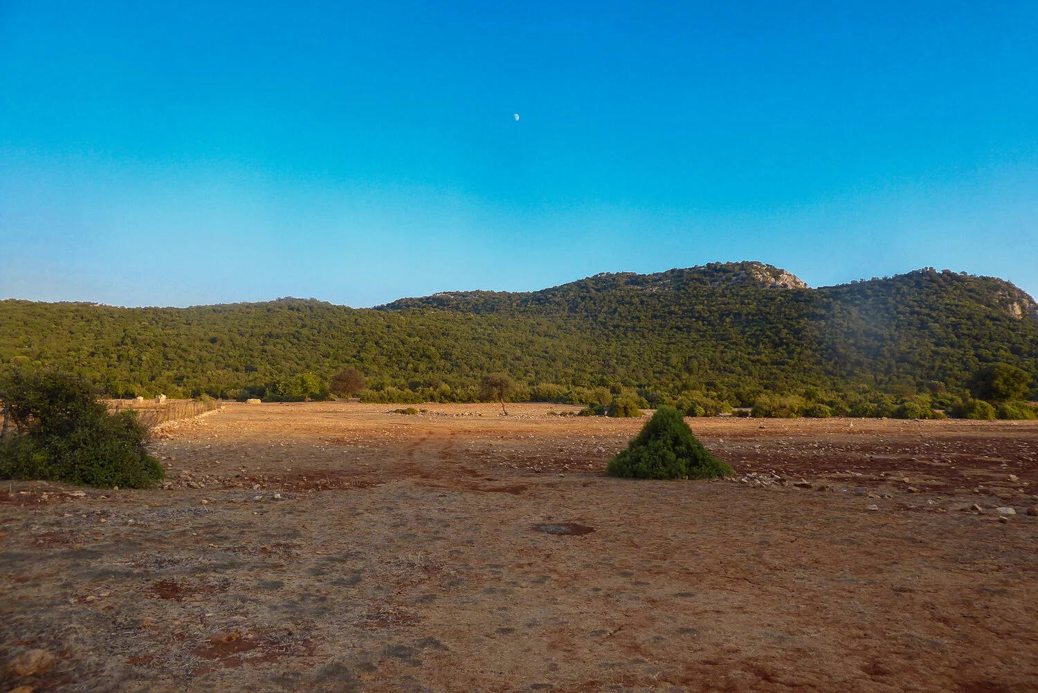 Red dirt plateau at the top of the hill