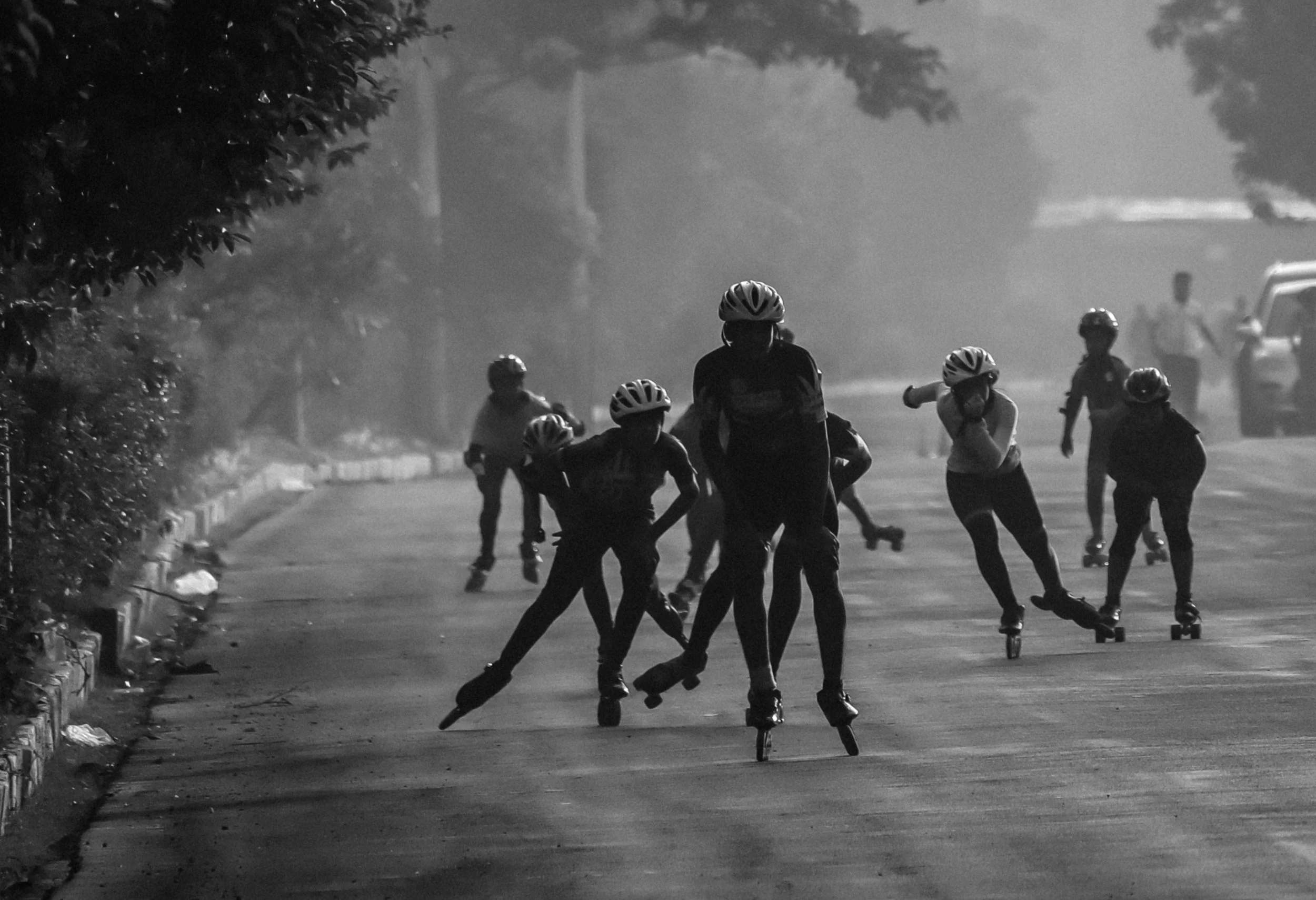 A black and white photo of a group of people roller blading - representing dynamic resourcing from FSI to support those who need specific regulatory, technical or commercial skills in their medical device or combination product development journey