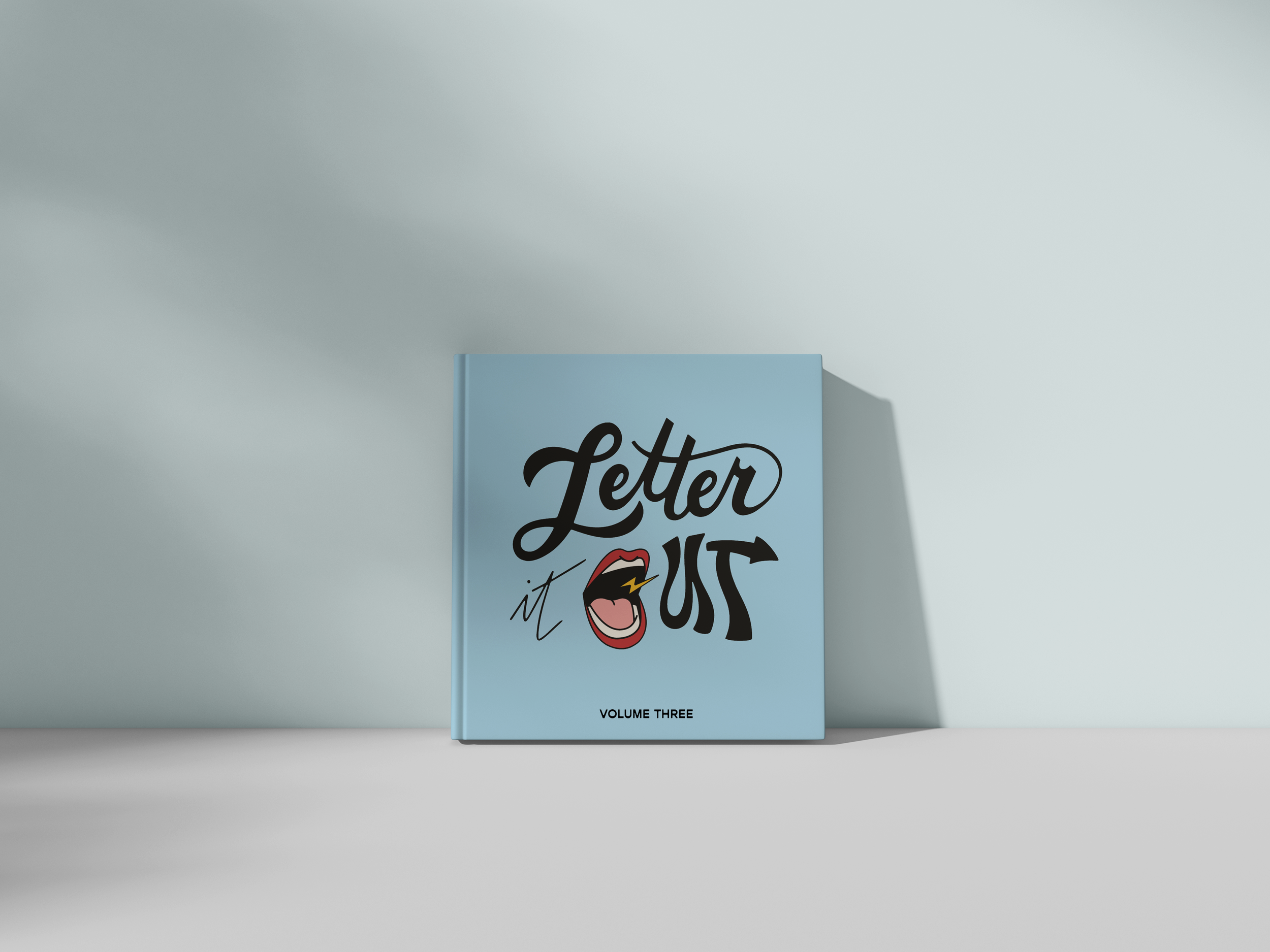 Square book mockup.png