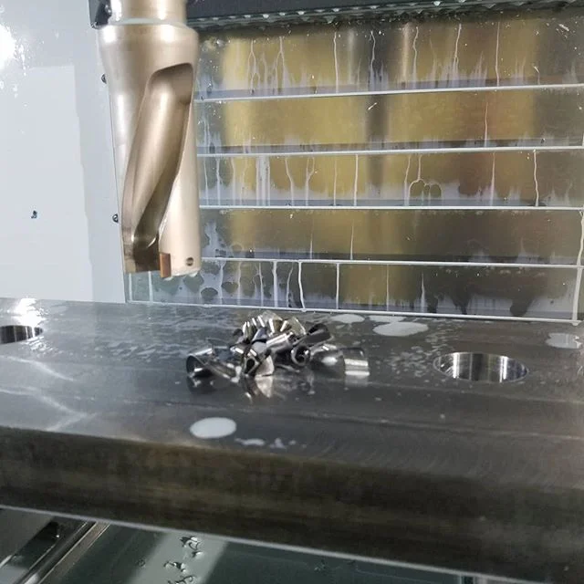 1.7 inch diameter holes in 1.5 inch thick mild steel in just a few seconds.  Look at those big chips!

#cncmachining #cnc #machining #drilling #custom #gofab