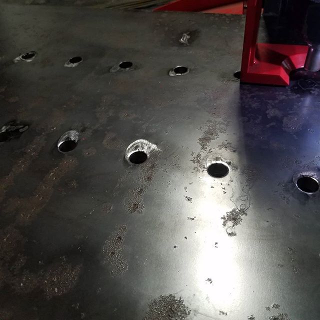 Popping holes 11/16 holes in 5/8 steel plate with no hands free... #ironworker #punch #custom #gofab