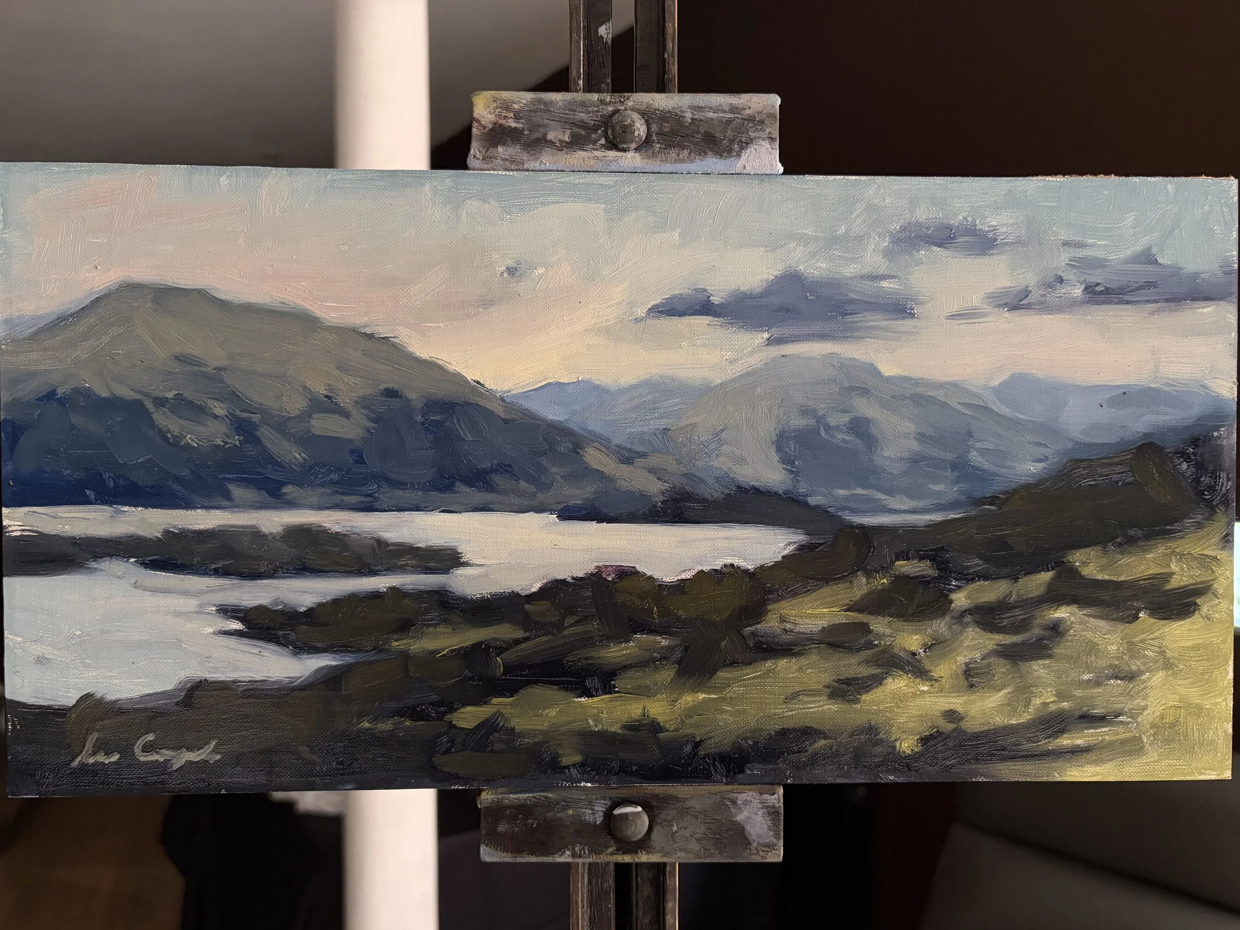 Original oil painting of Loch Lomond from Conic Hill displayed on a studio easel by Scottish artist Lee Craigmile.