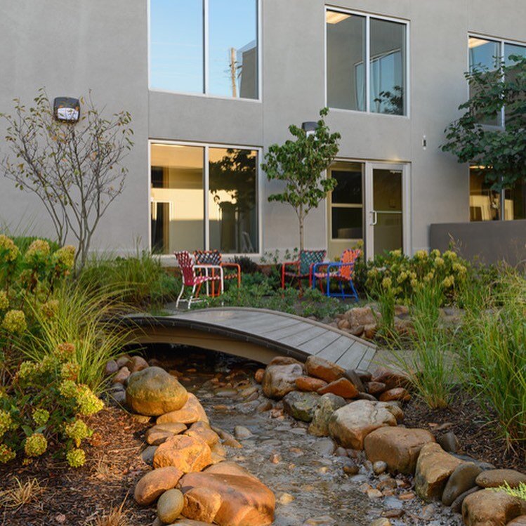 Center for Women and Families Courtyard was such a rewarding project. We transformed this walled space into a garden oasis with spaces for children and mothers. Views to the garden from within the building were lovely as well. #naturalplay #therapeut