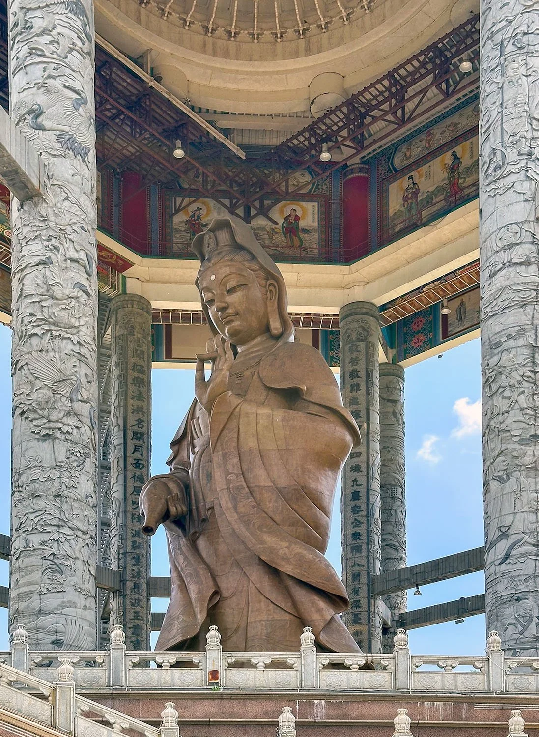 Medium distance view of the massive Guan Yin statute at Kek Lok Si temple on Penang Island, Malaysia.