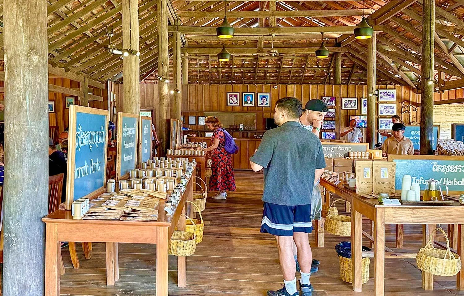 Tourists browse a pepper shop at La Plantation pepper farm near Kampot, Cambodia.