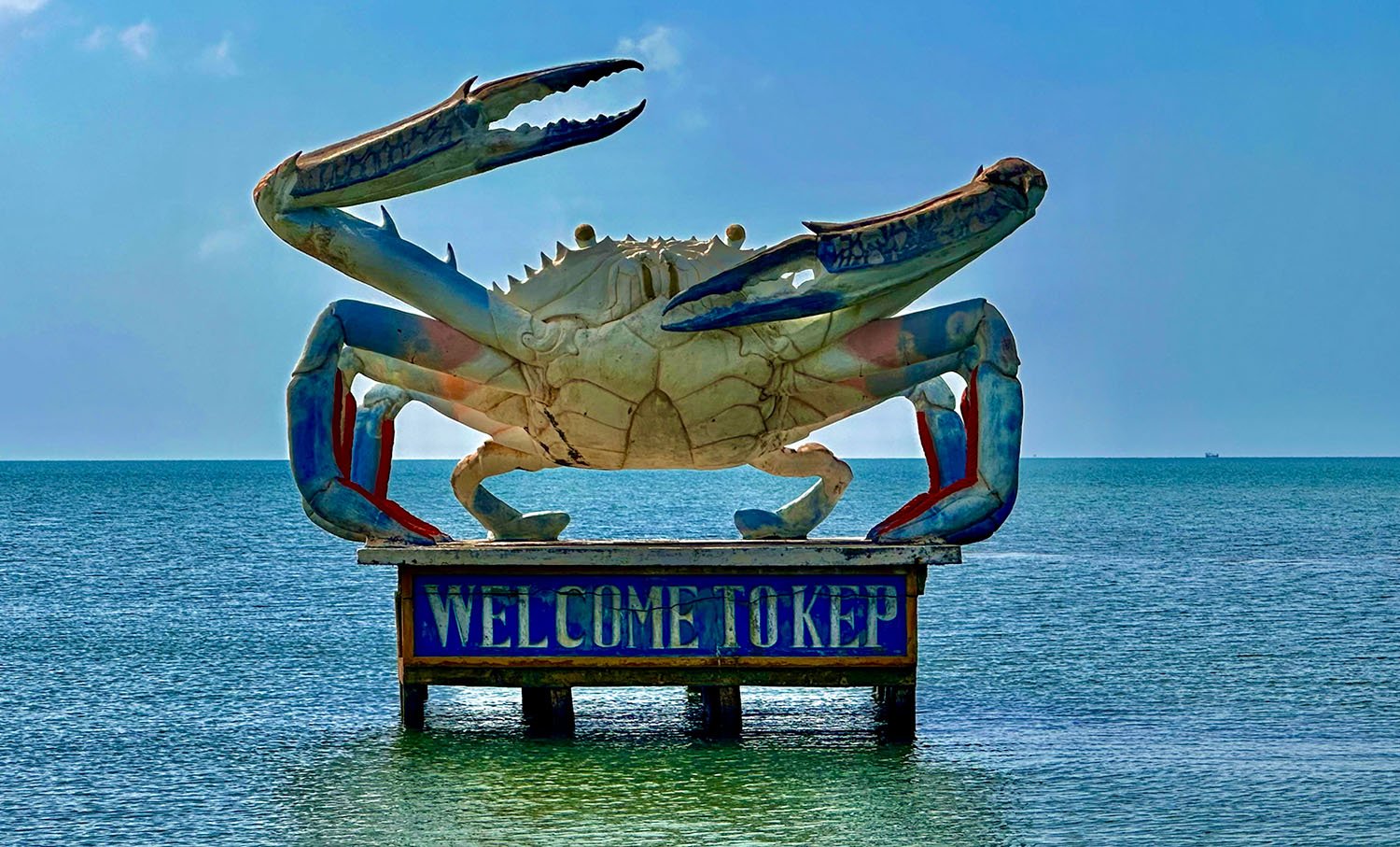 Iconic big crab sculpture protruding from the ocean at Kep, Cambodia.